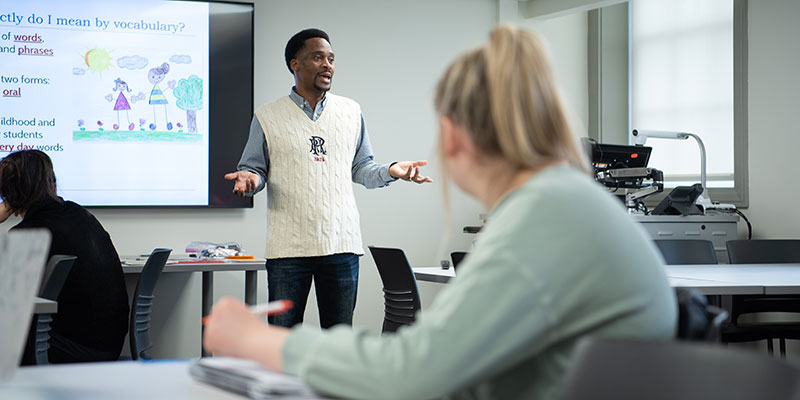 Professor lecturing in a classroom