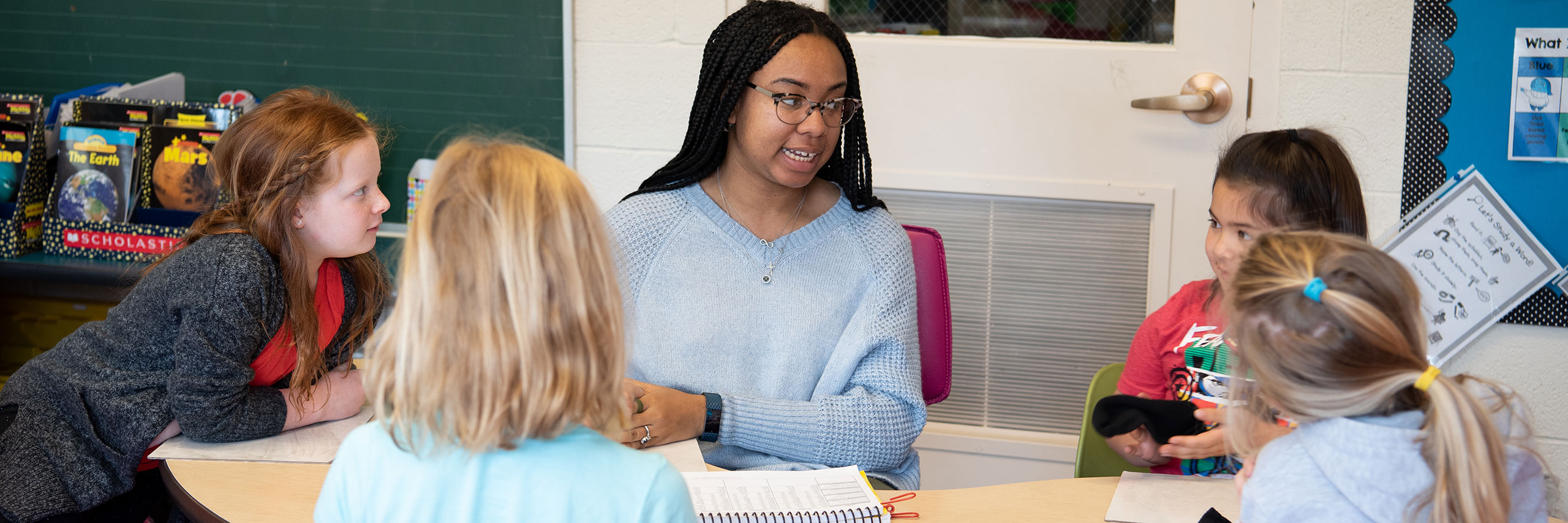 A teacher talking to students